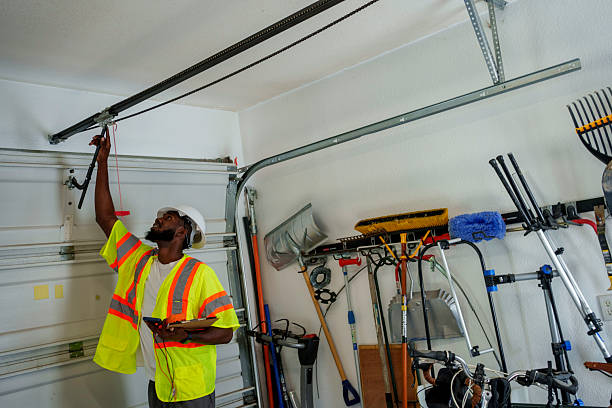Professional Garage Door Panel Replacement technician working in Arvada, CO